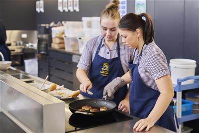 2 girls cooking