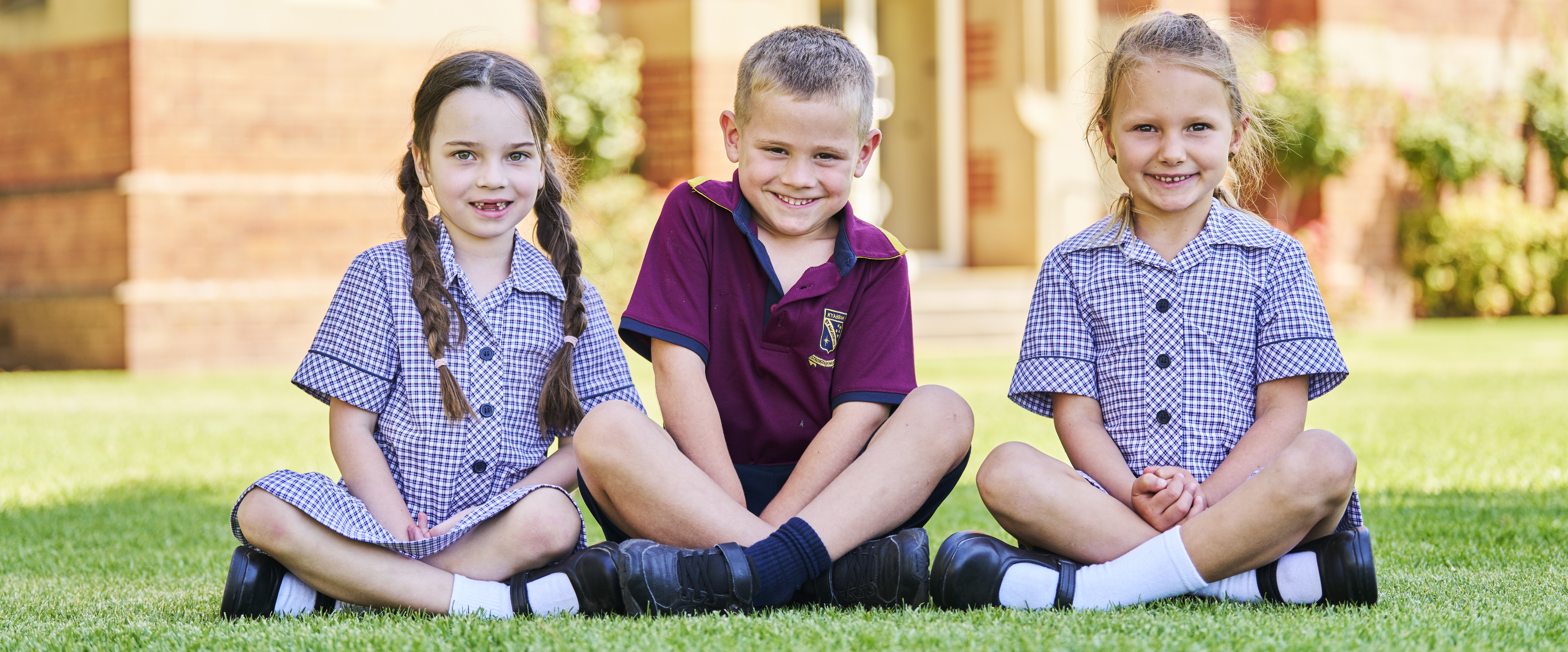 3 students sitting